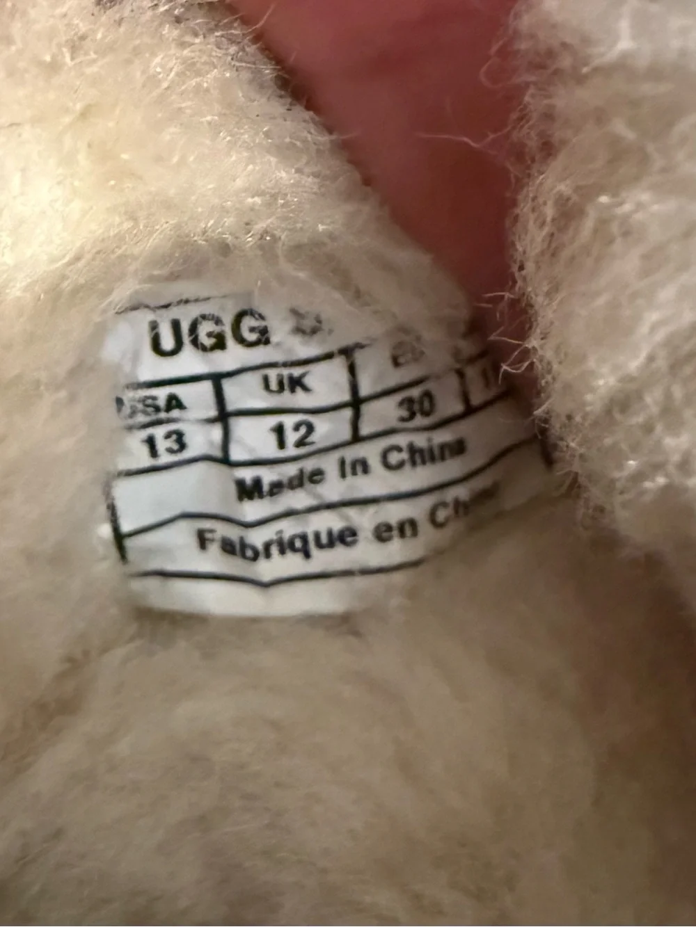 UGG Girl’s Black Moccasin Slipper with Pink Laces